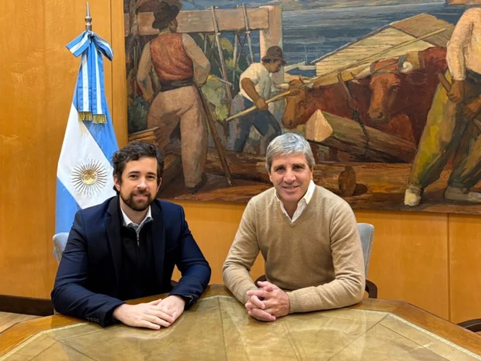 Santiago Migone y Luis Caputo. Santiago Migone y Luis Caputo.